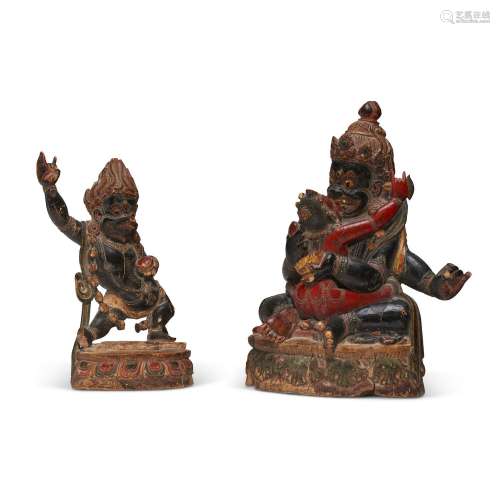 A GROUP OF TWO PAINTED WOODEN FIGURES OF CHATURBHUJA MAHAKAL...