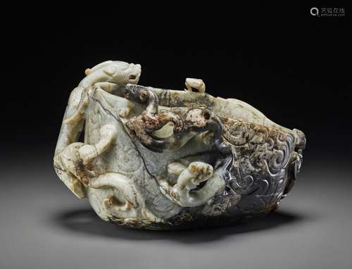 A MOTTLED 'CHICKEN-BONE' JADE LIBATION VESSEL