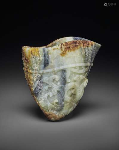 A VERY RARE IMPERIALLY INSCRIBED GREY, RUSSET AND BLACK JADE...