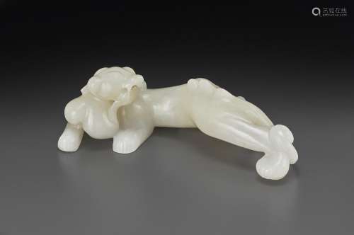 A PALE BEIGEISH-WHITE JADE FIGURE OF A STRIDING CHILONG