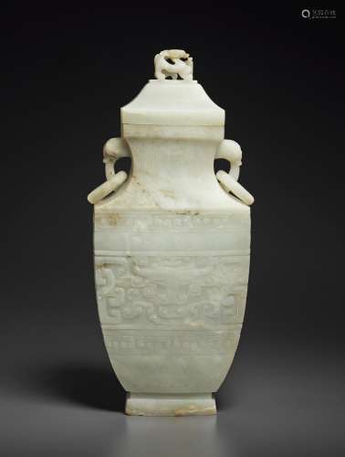 A PALE GREENISH-WHITE JADE ARCHAISTIC VASE AND COVER