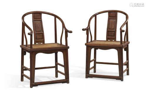 A PAIR OF HUANGHUALI HORSESHOE-BACK ARMCHAIRS