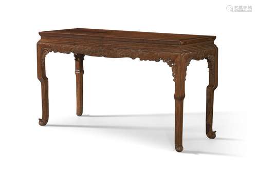 A HUALI CORNER-LEG TABLE