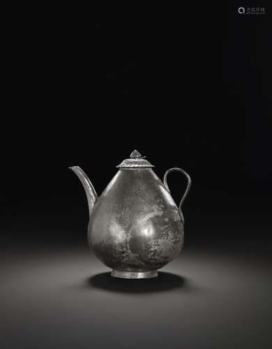 A RARE SILVER EWER AND COVER