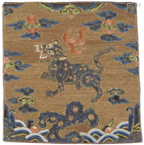 A VERY RARE EMBROIDERED GOLD-GROUND RANK BADGE OF A LEOPARD,...