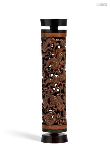 A FINELY CARVED BAMBOO AND HARDWOOD CYLINDRICAL INCENSE HOLD...