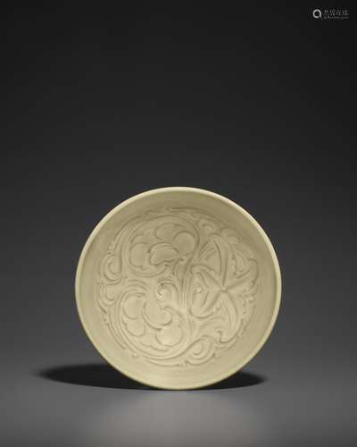 A CARVED YAOZHOU CELADON BOWL