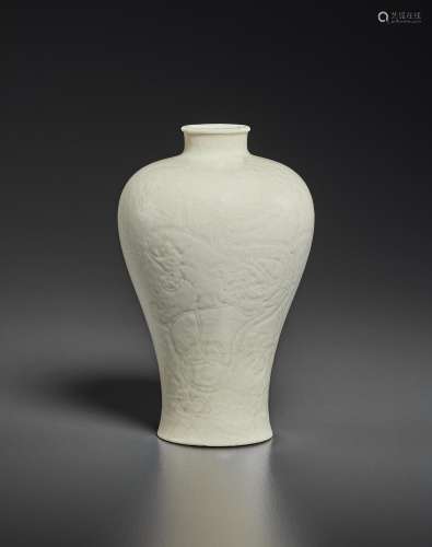 A SMALL WHITE-GLAZED CARVED SOFT-PASTE VASE, MEIPING