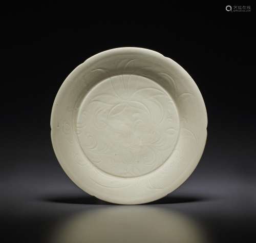 A CARVED DING 'LOTUS’ DISH