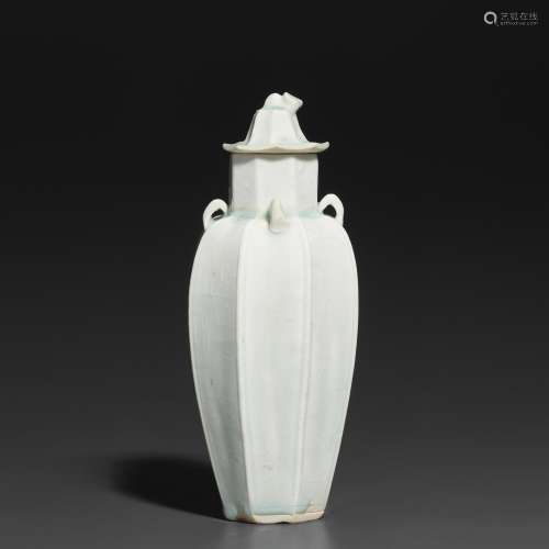 A SLENDER FLUTED QINGBAI VASE AND COVER