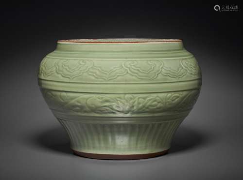 A RARE CARVED LONGQUAN CELADON JAR, GUAN