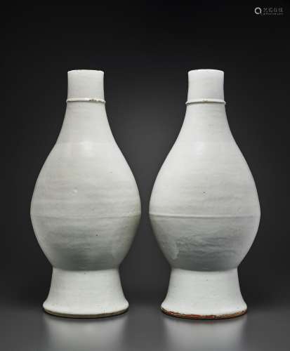 A VERY RARE PAIR OF LARGE INCISED WHITE-GLAZED VASES