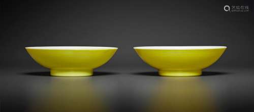 A PAIR OF LEMON-YELLOW-ENAMELED DEEP DISHES