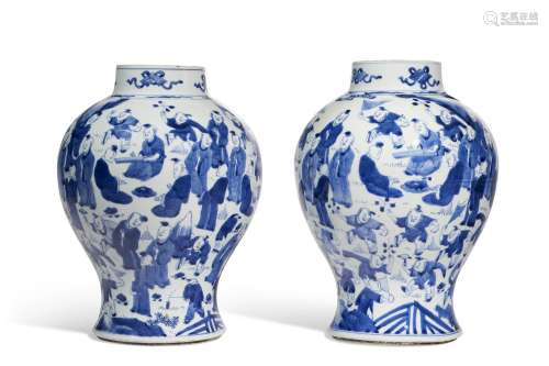 A RARE PAIR OF BLUE AND WHITE 'HUNDRED BOYS' JARS