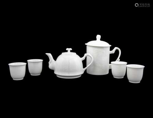 A Set of White Glazed Porcelain Teapot and Tea Cups and A Co...