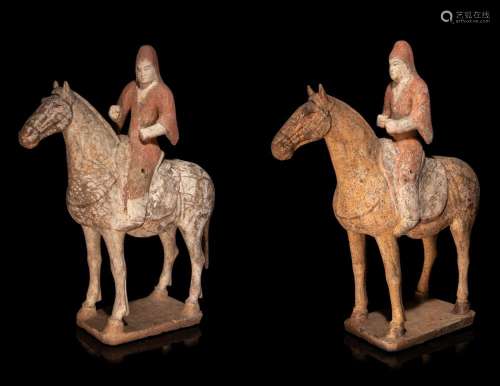 A Pair of Painted Pottery Equestrian Figures