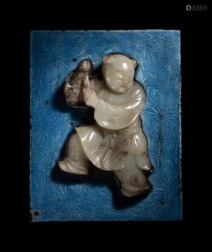 A Pale Celadon Jade Carving of a Boy