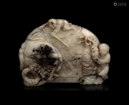 A Carved Jade ‘Elephant and Children’ Figural Group