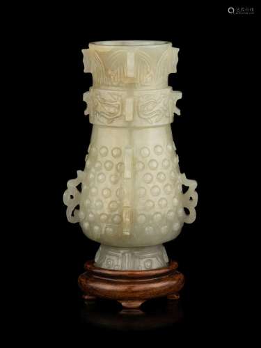 A Carved Pale Celadon Jade Hu Vase