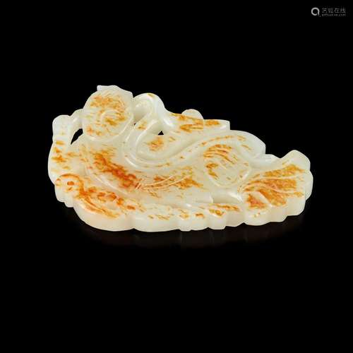 WHITE JADE WITH RUSSET SKIN CARVING OF AN APSARA 19TH-20TH C...