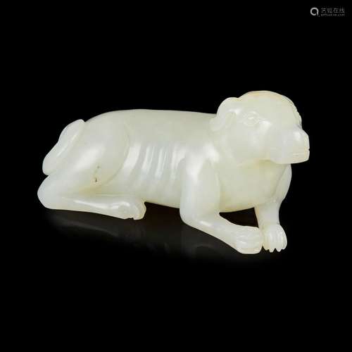 WHITE JADE WITH RUSSET SKIN CARVING OF A RECLINING DOG 19TH-...