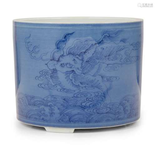 BLUE AND WHITE WITH BLUE-GROUND 'QILIN' BRUSH POT