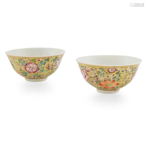 PAIR OF YELLOW-GROUND FAMILLE ROSE 'FLOWER' CUPS QING DYNAST...