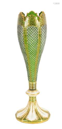 A 19TH CENTURY GREEN GLASS AND WHITE OVERLAY GILT VASE