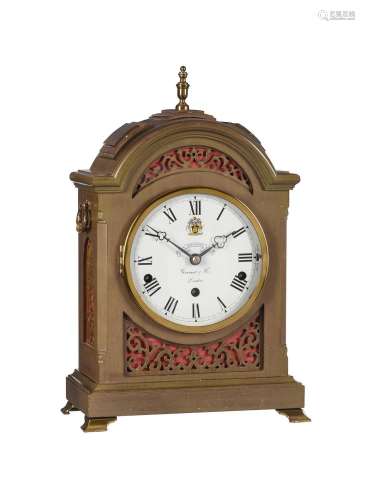 A BRASS MOUNTED MAHOGANY QUARTER-CHIMING CLOCKMAKERS COMPANY...