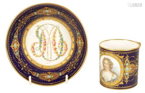 AN 18TH CENTURY SEVRES ROYAL BLUE PORTRAIT CABINET CUP AND S...