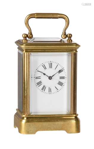 A FRENCH BRASS MINIATURE CARRIAGE TIMEPIECE