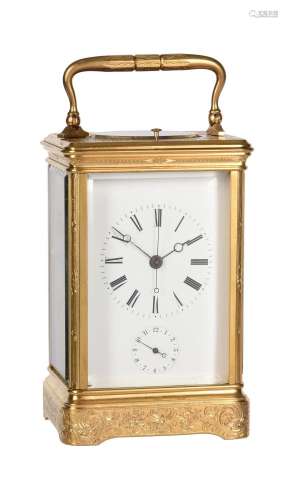 A FRENCH ENGRAVED GILT BRASS CENTRE-SECONDS REPEATING ALARM ...