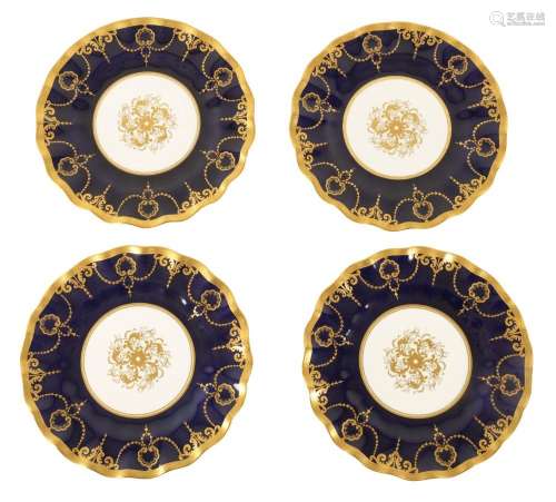 A SET OF FOUR ROYAL CROWN DERBY BONE CHINA SCALLOPED MOULDED...