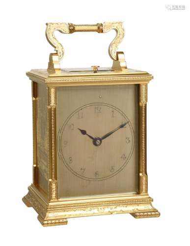 A GILT BRASS REPEATING CARRIAGE CLOCK WITH FINE ENGRAVED LON...