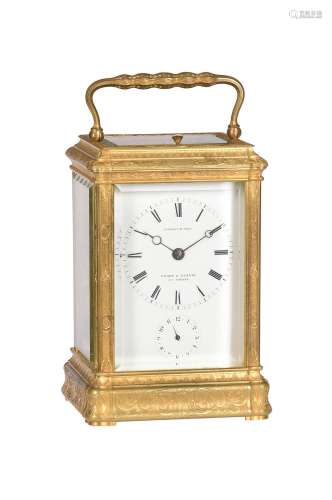 A FRENCH ENGRAVED GILT BRASS GORGE CASED CARRIAGE CLOCK WITH...