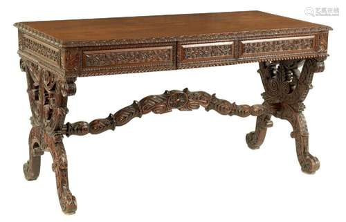 A REGENCY ANGLO INDIAN CARVED HARDWOOD LIBRARY TABLE