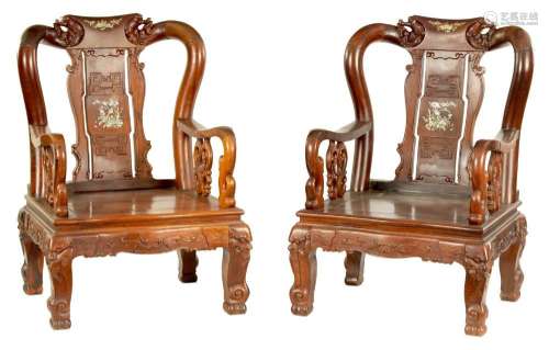 A PAIR OF 20TH CENTURY CHINESE HARDWOOD OVERSIZED ARM CHAIRS
