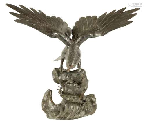 A 19TH CENTURY CHINESE PATINATED BRONZE SCULPTURE OF AN EAGL...