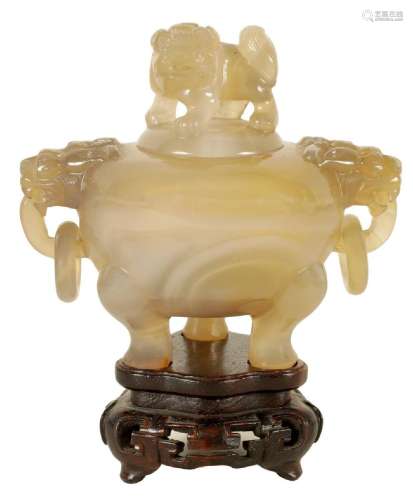 A CHINESE AGATE KORO AND COVER ON STAND