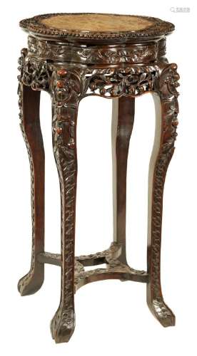 A 19TH CENTURY CHINESE CARVED HARDWOOD TALL JARDINIERE STAND