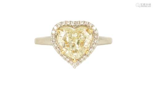 A LADIES PLATINUM 2.23CT FANCY YELLOW HEART SHAPED SOLITAIRE...