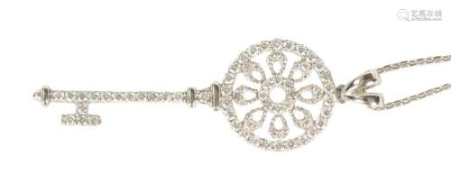 AN 18CT WHITE GOLD DIAMOND ENCRUSTED KEY PENDANT AND CHAIN N...
