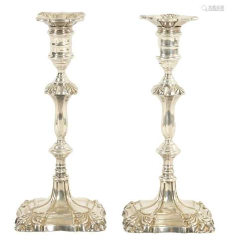 A PAIR OF 19TH CENTURY GEORGE I STYLE SILVER PLATED CANDLEST...