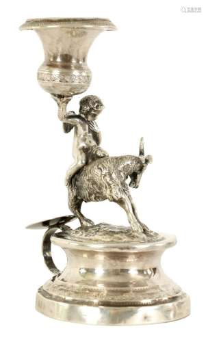 A 19TH CENTURY CONTINENTAL SILVER FIGURAL CANDLESTICK