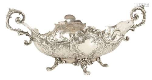 A GEORGE V CONTINENTAL ROCOCO STYLE SILVER BOAT SHAPED SWEET...