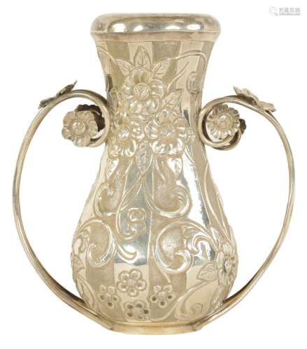 AN EARLY 20TH CENTURY EASTERN SILVER TWO HANDLED VASE