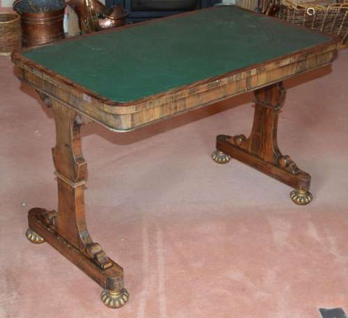A 19th century rosewood library table, the rounded rectangul...