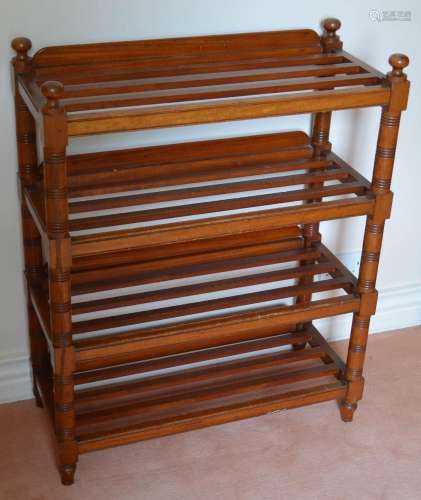 A 19th century mahogany slatted four-tier whatnot of rectang...