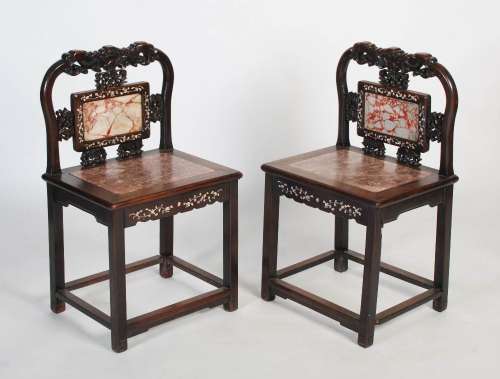 A pair of Chinese carved hardwood, mother of pearl inlaid an...