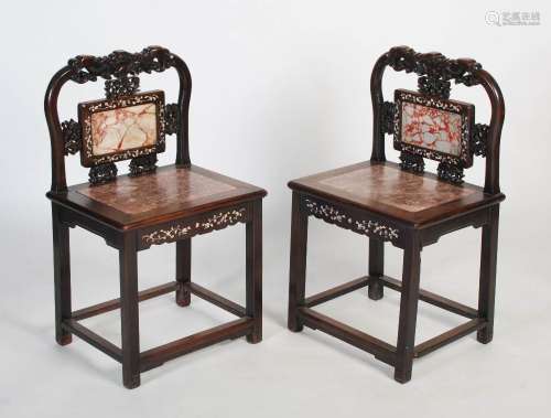 A pair of Chinese carved hardwood, mother of pearl inlaid an...